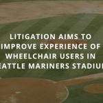 Litigation aims to improve experience of wheelchair users in Seattle Mariners stadium (white san serif font, capitalized, over faded image of empty ball field)